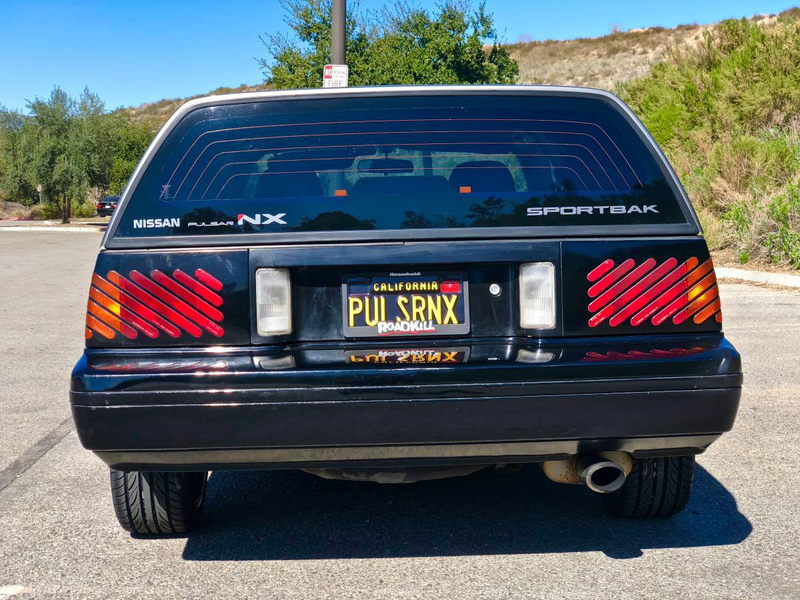 Illustration for article titled For $5,000, Could This Two-Top Two-Back 1987 Nissan Pulsar NX SE Be Too Much?